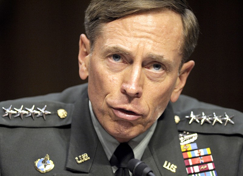
              FILE - In this June 23, 2011, file photo, CIA Director nominee Gen. David Petraeus testifies on Capitol Hill in Washington, before the Senate Intelligence Committee during a hearing on his nomination. The Justice Department said Tuesday, March 3, 2015, that the former top Army general has agreed to plead guilty to mishandling classified materials. A statement from the agency says a plea agreement has been filed in U.S. District Court in Charlotte, N.C., the hometown of Paula Broadwell, the general’s biographer and former mistress. (AP Photo/Cliff Owen, File)
            