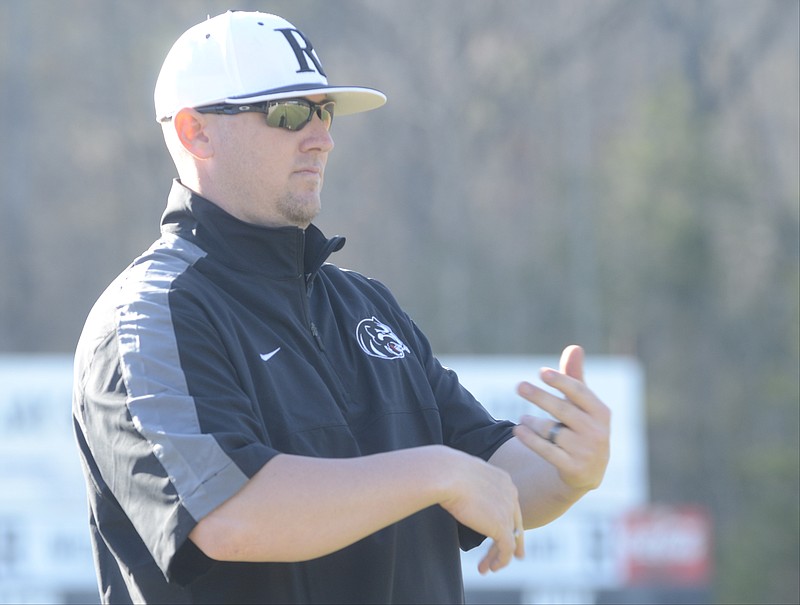 Ridgeland coach Scott Harden signs during a game at Ridgeland High School in this 2014 file photo.