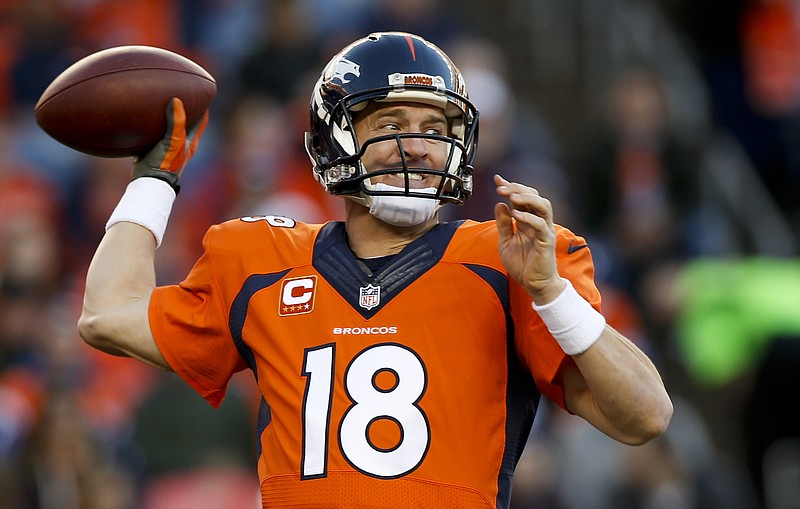 Denver Broncos quarterback Peyton Manning passes against the Buffalo Bills during an NFL football game in Denver in this Dec. 7, 2014, file photo.