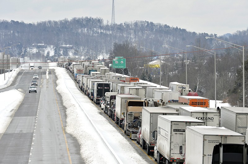 Traffic backs up as more than 50 miles of Interstate 65 southbound is shut down from the weather on March 5, 2015, near Mount Washington, Ky.