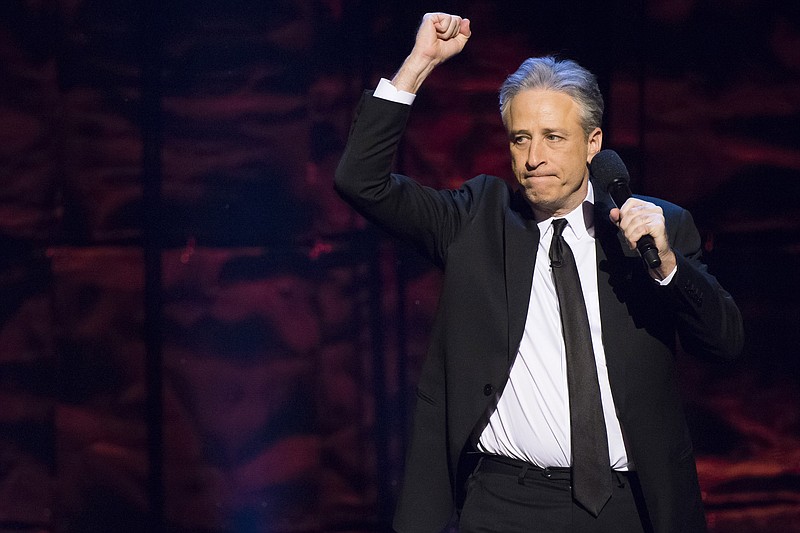 
              FILE - In this Feb. 28, 2015 file photo, Jon Stewart hosts Comedy Central's "Night of Too Many Stars: America Comes Together for Autism Programs" at the Beacon Theatre in New York. The telethon airing Sunday from 8 p.m. to 10 p.m. EDT, will raise money for autism educational programs. (Photo by Charles Sykes/Invision/AP)
            