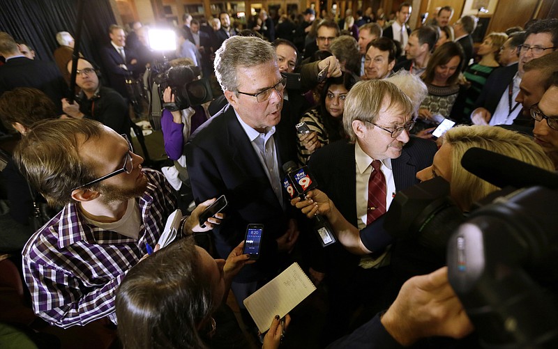 
              Former Florida Gov. Jeb Bush speaks to members of the media during a reception for U.S. Rep. David Young, R-Iowa, Friday, March 6, 2015, in Urbandale, Iowa. (AP Photo/Charlie Neibergall)
            