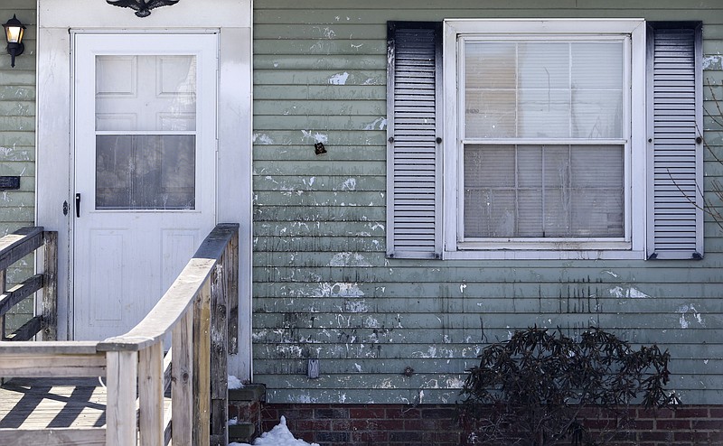 
              A home that has been pelted with eggs several times a week for a year is shown Friday, March 6, 2015, in Euclid, Ohio. Police haven't been able to crack the unusual case despite doing stakeouts, questioning neighbors, installing a surveillance camera and even testing eggshells as evidence. (AP Photo/Tony Dejak)
            