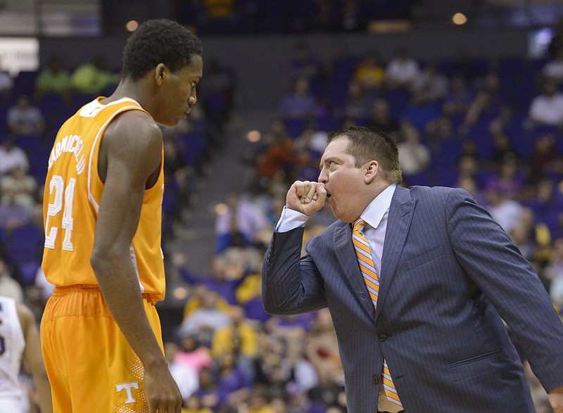 Tennessee's head basketball coach Donnie Tyndall talks to Willie Carmichael during their game against LSU on March 4, 2015, in Baton Rouge, La. (AP Photo/The Advocate, Heather McClelland)