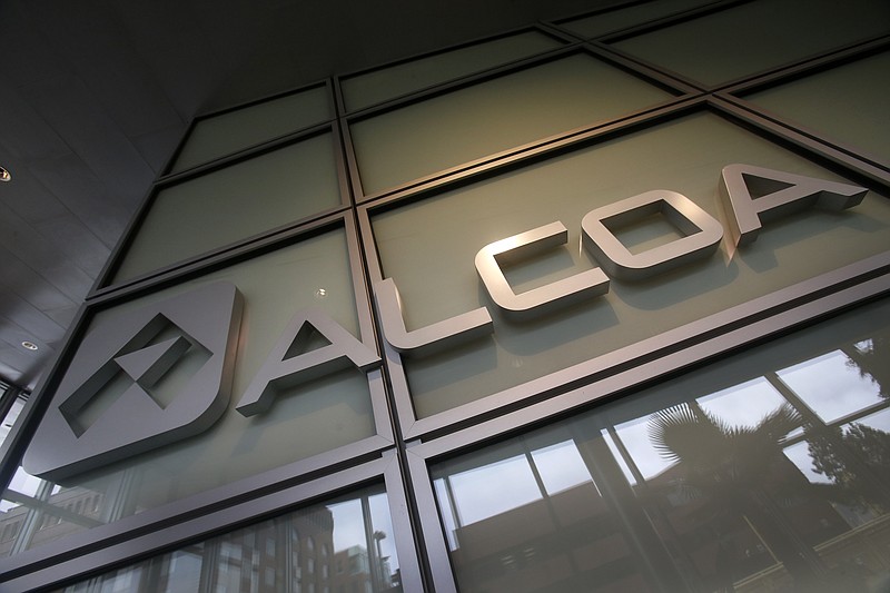 This 2014 photo shows the Alcoa logo in the lobby of Alcoa's headquarters in Pittsburgh. 