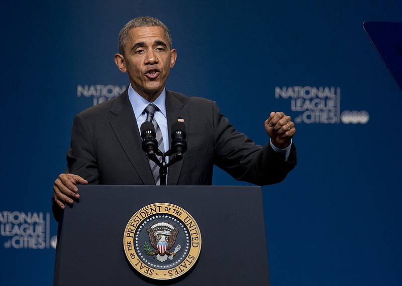 President Barack Obama speaks at the National League of Cities annual Congressional City Conference in Washington, Monday, March 9, 2015. Targeting stagnant wages in an otherwise improving economy, the president is calling on employers, educational institutions and local governments to ramp up training and hiring of high-technology in an effort to drive up higher-income employment.