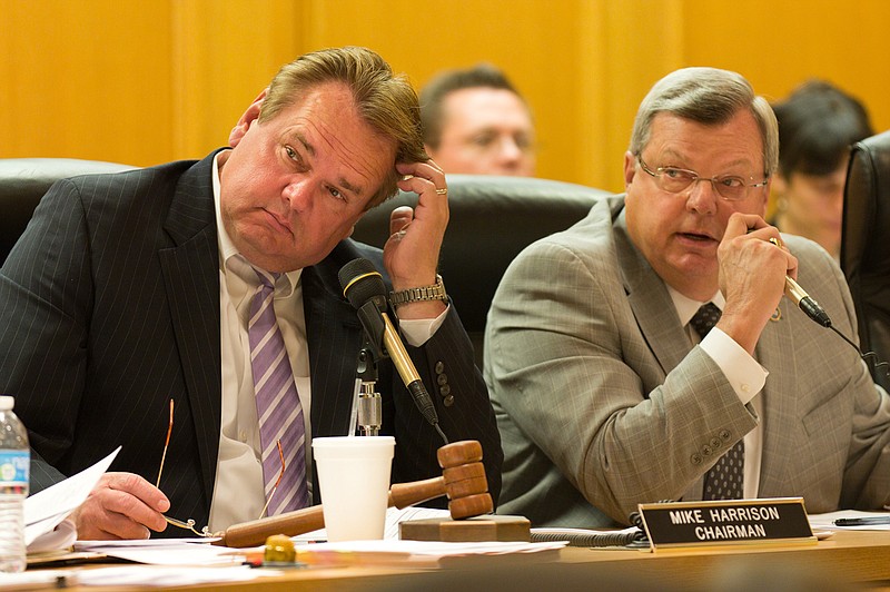 Republican Reps. Mike Harrison of Rogersville, left, and Curtis Johnson of Clarksville participate in a House budget subcommittee meeting in Nashville on Monday, April 23, 2012.