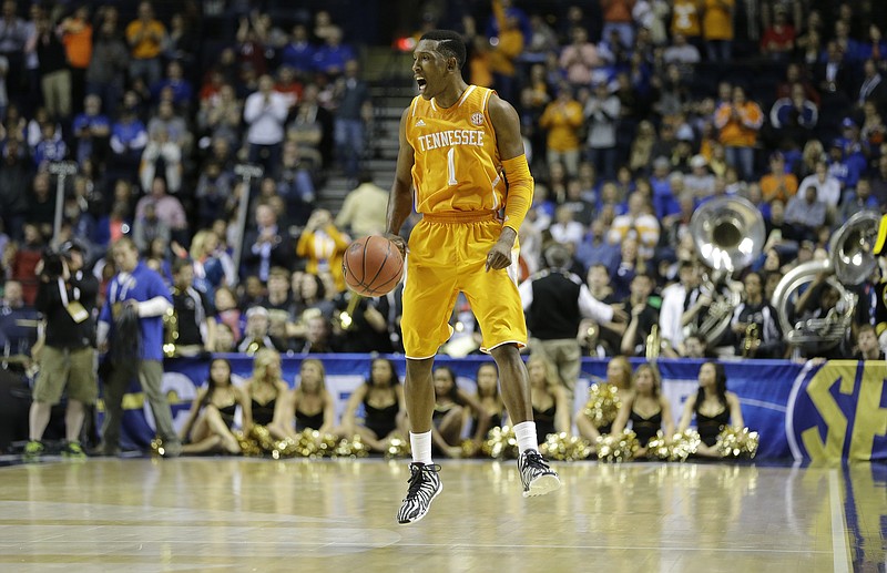 Tennessee guard Josh Richardson (1) celebrates after an NCAA college basketball game in the second round of the Southeastern Conference tournament against Vanderbilt, Thursday, March 12, 2015, in Nashville, Tenn. Tennessee won 67-61. (AP Photo/Mark Humphrey)
