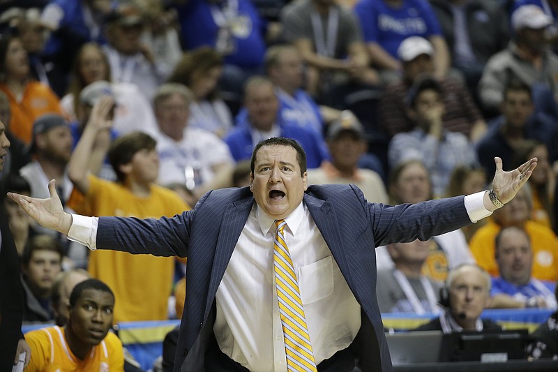 Tennessee head coach Donnie Tyndall reacts against Vanderbilt during their game in the second round of the Southeastern Conference tournament on, March 12, 2015, in Nashville.