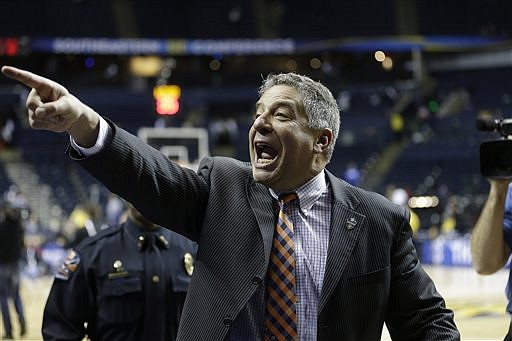 Auburn head coach Bruce Pearl celebrates after his game in Nashville against Texas A&M in this March 12, 2015, file photo.