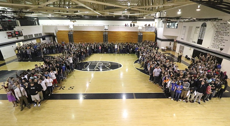 Ridgeland High School students gather in their gymnasium Friday to form the symbol for "pi" in honor of Pi Day. The school set a world record incorporating 849 bodies in the symbol, smashing the previous record of just more than 500.