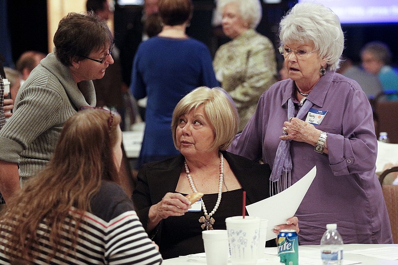 Walker County Commissioner Bebe Heiskell, center, talks with Betty Keys, right, and Barbara Ashburn, left, during the Walker County Republican Party Convention on Saturday at the Walker County Civic Center in Rock Spring, Ga. The party voted at the convention against a ballot measure that would let voters decide whether the county should have more than a single commissioner.