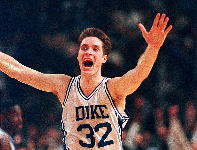 In this March 28, 1992, file photo, Duke's Christian Laettner runs down the court after making the last second, game-winning shot to defeat Kentucky 104-103 in overtime of the East Regional Final of the NCAA college basketball tournament in Philadelphia.