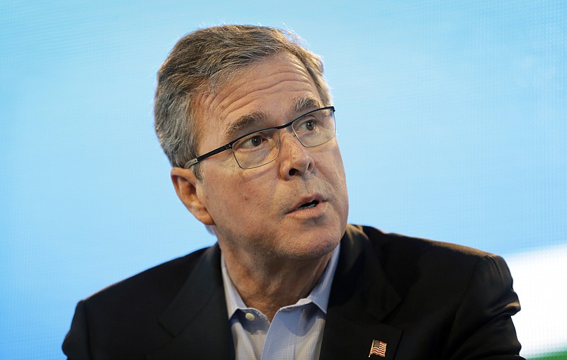 
              FILE - In this March 7, 2015, file photo, former Florida Gov. Jeb Bush speaks during the Iowa Agriculture Summit in Des Moines, Iowa. As he prepared for a run for the White House, Bush resigned from corporate positions. And while little noticed at the time, Florida timber Rayonier Inc., faced a flurry of lawsuits not long before his exit. (AP Photo/Charlie Neibergall, File)
            