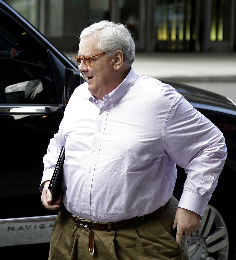 Tennessee Titans president and CEO Tommy Smith arrives at a hotel where NFL meetings are taking place in New York, Tuesday, Oct. 7, 2014. (AP Photo/Seth Wenig)