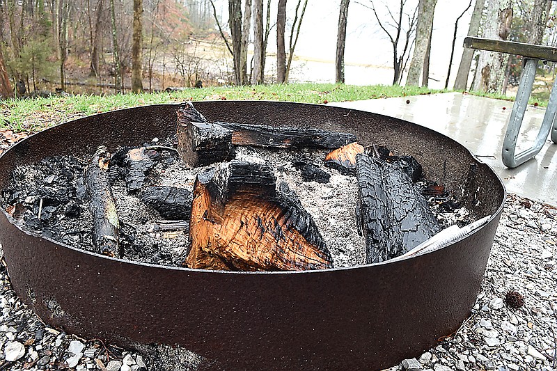 A campfire ring is seen Thursday at a campsite at Harrison Bay State Park near Chattanooga.