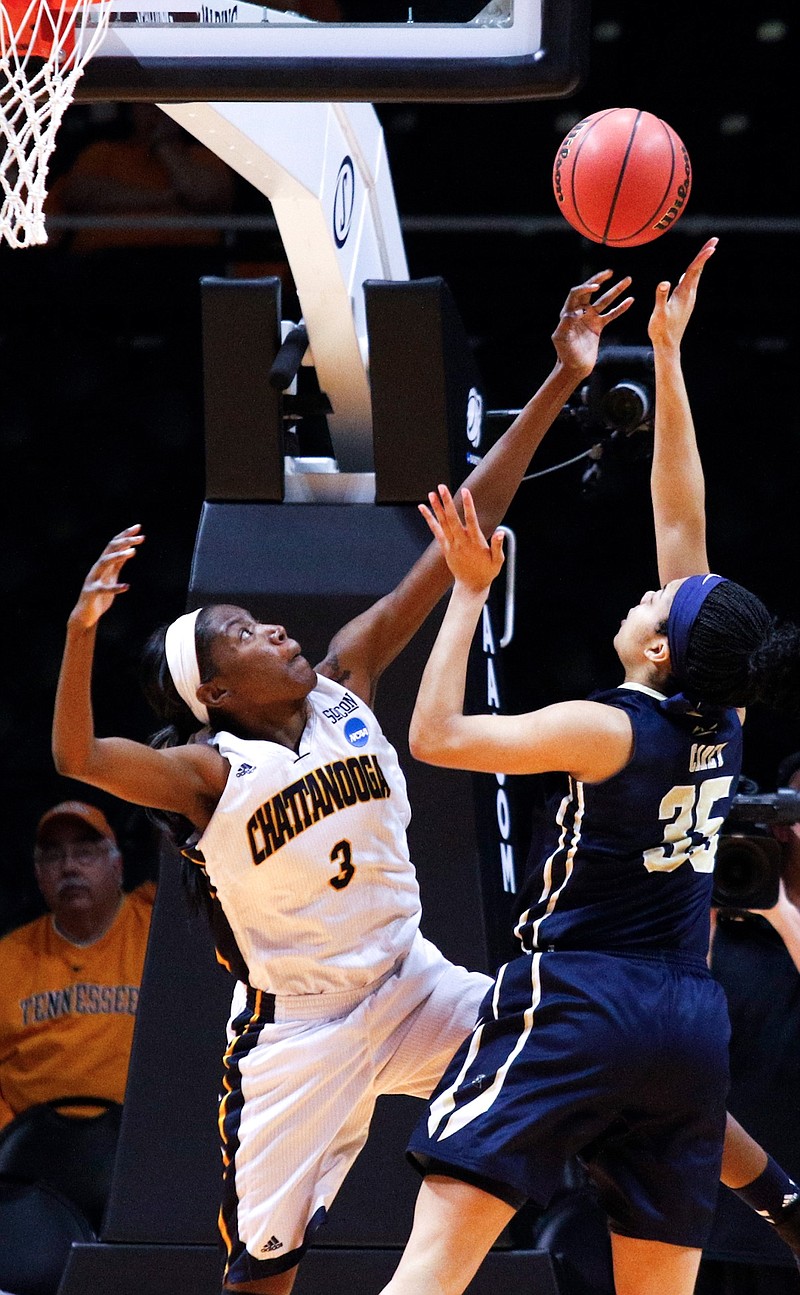 UTC forward Jasmine Joyner (3) blocks a shot by Pittsburgh forward Stasha Carey (35) in their NCAA tournament basketball game against the Pittsburgh Panthers on March 21, 2015, at the Thompson-Boling Arena in Knoxville.
