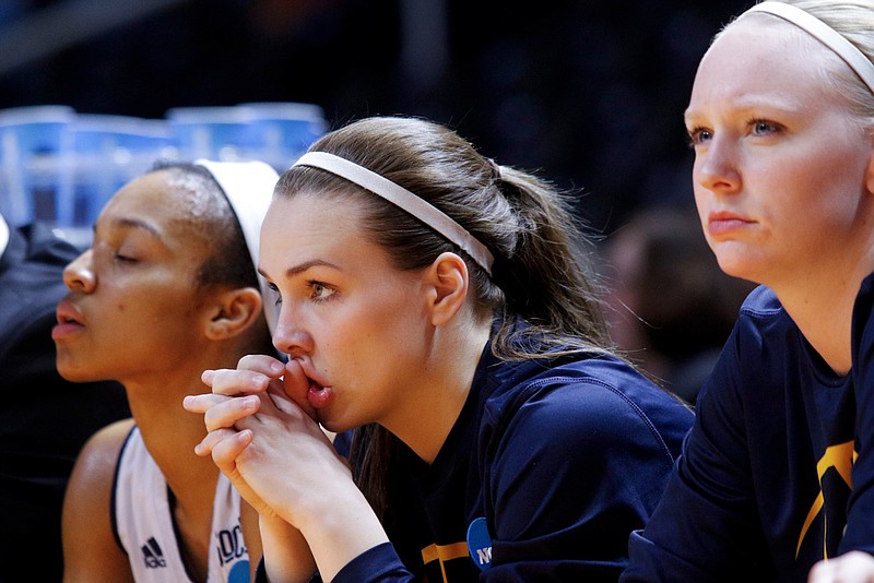 UTC players react on the bench as the team trails in the 2nd half of the Mocs' NCAA tournament basketball game against the Pittsburgh Panthers on Saturday, March 21, 2015, at the Thompson-Boling Arena in Knoxville, Tenn.