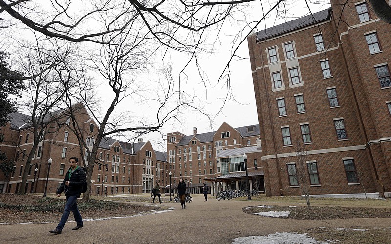 Students walk through the Warren College and Moore College area at Vanderbilt University on Tuesday, Feb. 24, 2015, in Nashville.