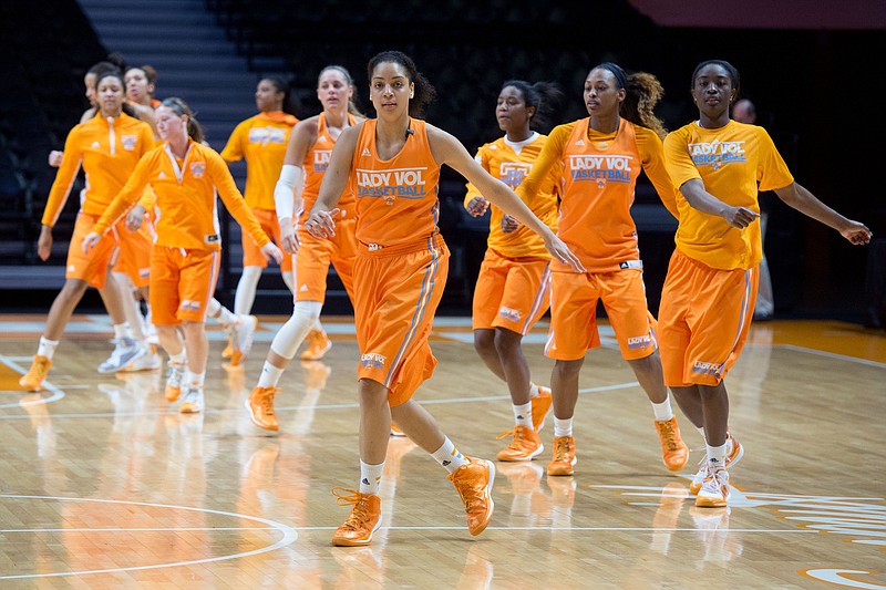 Lead by Tennessee senior Cierra Burdick, the Lady Vols warm up at practice at the NCAA women's college basketball tournament in Knoxville.