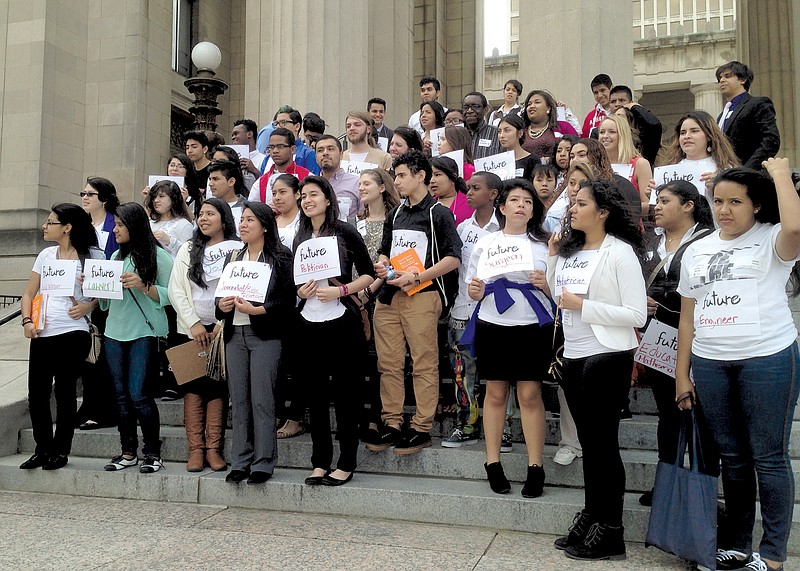 Students rally in support of legislation allowing high school graduates to attend college at in-state tuition prices.