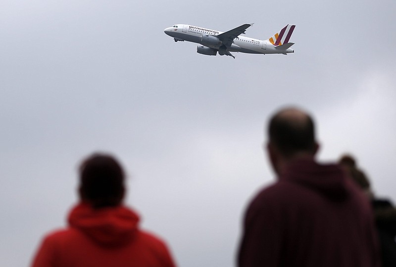 
              A Germanwings plane takes off at the airport in Duesseldorf, Wednesday March 25, 2015.  the day after a Germanwings aircraft crashed in France on the way from Barcelona, Spain,  to Duesseldorf, Germany, killing 150 people.   (AP Photo Frank Augstein)
            
