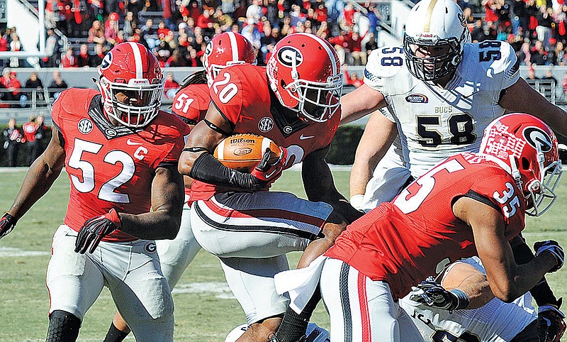 Georgia safety Quincy Mauger collected four interceptions last season, with his fourth coming in the rout of Charleston Southern.