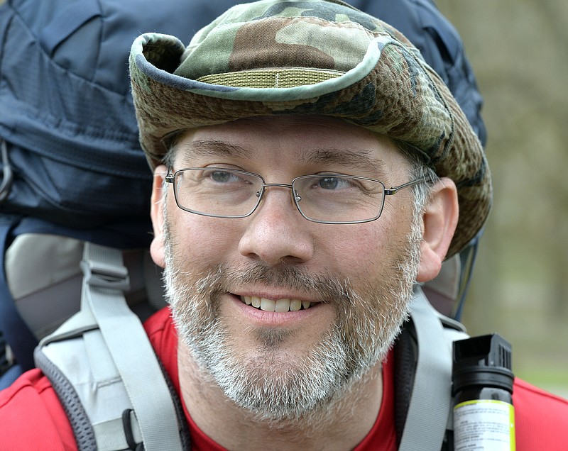 
              Curtis Penix smiles as he arrives at the site of the original Fort Boonesborough, Ky., Thursday, March 26, 2015. Penix walked the 240 mile Boone Trace following the trail his 5th great grandfather Joshua Penix walked with Daniel Boone in 1775. (AP Photo/Timothy D. Easley)
            