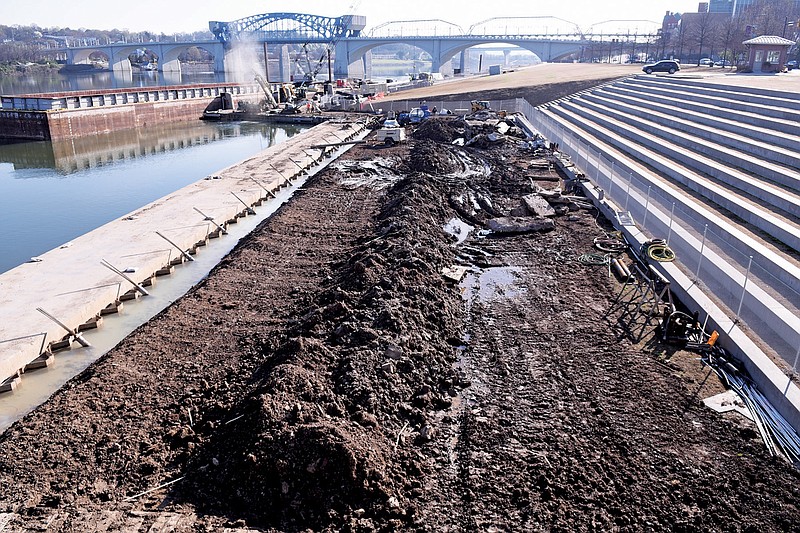 Work continues Tuesday on repairs to the 21st Century Waterfront area at Ross's Landing downtown.