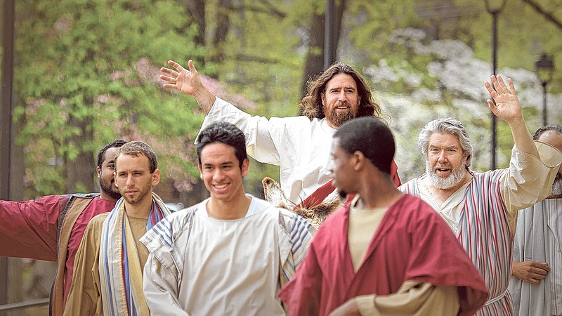 Eric Pinkston, one of six actors portraying Jesus In "SonRise," makes his triumphant entry into Jerusalem during last year's performance.