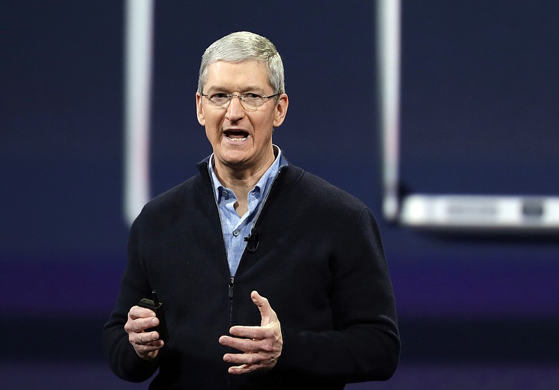 
              FILE - In this Monday, March 9, 2015, file photo, Apple CEO Tim Cook speaks during an Apple event in San Francisco. Cook is joining a long list of magnates promising to give away most of the wealth that they amass during their careers. Cook mentioned his intentions in a story about him released Thursday, March 26, 2015, by Fortune magazine. After paying for the college education of his 10-year-old nephew, Cook says he will donate the rest of his money to philanthropic causes. (AP Photo/Eric Risberg, File)
            