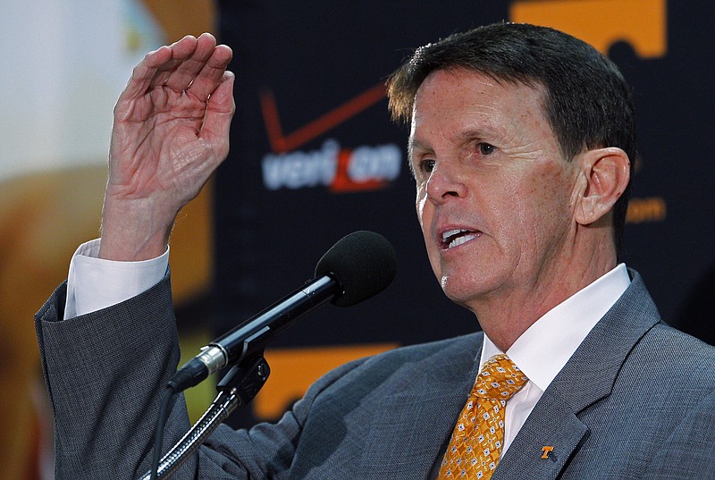 University of Tennessee athletic director Dave Hart gestures as he speaks reporters about the firing of head basketball coach Donnie Tyndall on March 27, 2015, in Knoxville.