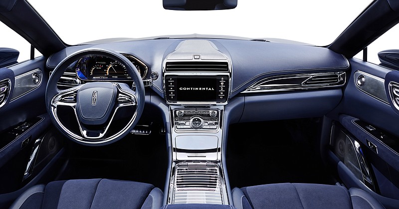 
              This product image provided by the Ford Motor Co. shows the interior of the new Lincoln Continental concept. Thirteen years after the last Continental rolled off a Michigan assembly line, Ford Motor Co. is debuting the new Continental in concept form at the New York Auto Show on Monday, March 30, 2015.The production version goes on sale next year. (AP Photo/Ford Motor Co.)
            