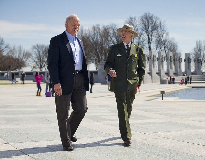 
              In this Monday, March 23, 2015 photo, National Park Service Director Jonathan Jarvis, right, and the head of the National Park Foundation Dan Wenk walk at the World War II Memorial on the National Mall in Washington. With its centennial approaching in 2016, the park service will launch a major campaign Thursday, April 2 in New York City to raise support and introduce a new, more diverse generation of millennials and children to "America's best idea," the national parks. (AP Photo/Pablo Martinez Monsivais)
            