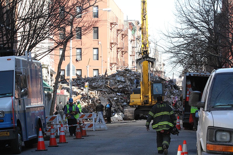 A pile of rubble is seen Sunday, March 29, 2015, at the site of an apparent gas explosion that took place three days earlier in the East Village neighborhood of New York. 