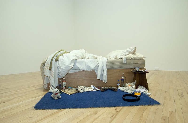 
              A general view of British artist Tracey Emin's work entitled 'My Bed' as the gallery highlights new and rehung works of art at the Tate Britain gallery in London, Monday, March 30, 2015. Emin's bed was originally showcased at the gallery some 15 year ago. (AP Photo/Alastair Grant)
            