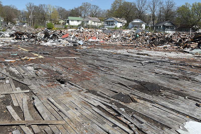 The former site of the R. L. Stowe plant in Lupton City is seen in a partial state of demolition on March 31, 2015, in Chattanooga. Work has stopped at the site, and people in the surrounding neighborhood are left with an eyesore. 