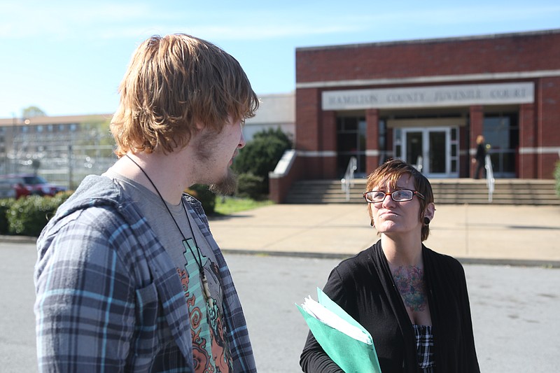 WIll and Diana McBryar leave Hamilton County Juvenile Court after a hearing on a motion for their daughter Tobi's immediate release from state custody on Wednesday, April 1, 2015 in Chattanooga.