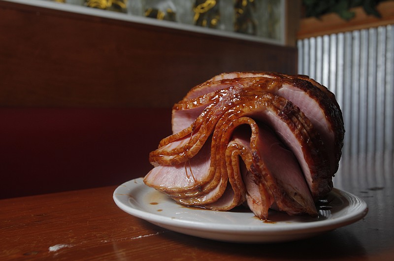 Pictured is a spiral-sliced, sugar-glazed ham from Bone's Smokehouse on East Brainerd Road, shot on Wednesday, Dec. 14, 2011.