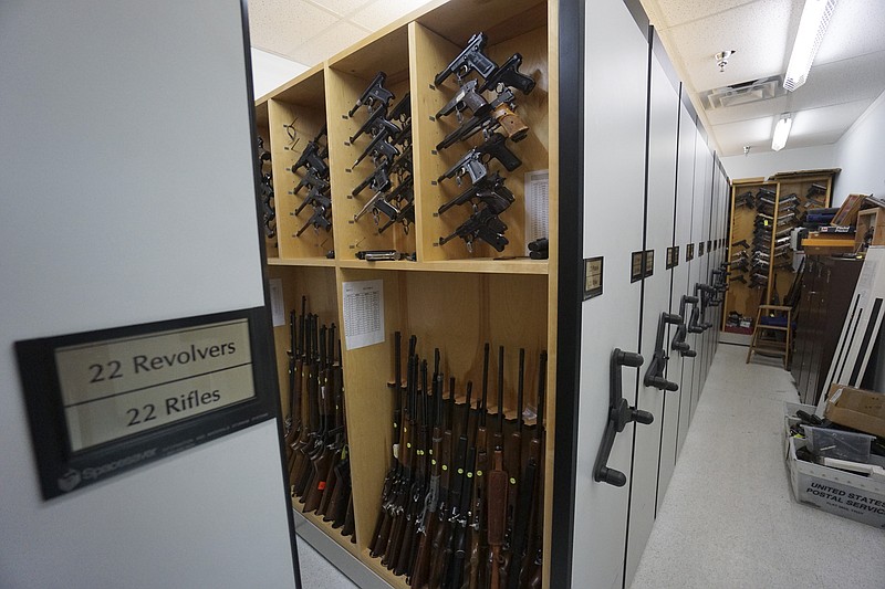 A variety of guns are stored in the Tennessee Bureau of Investigation's firearms reference vault department on March 27, 2015. 