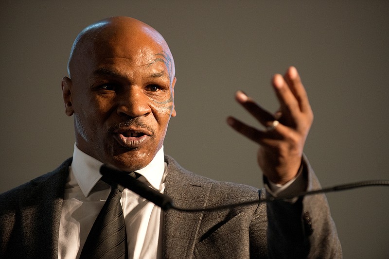 
              Former heavyweight boxing champion Mike Tyson speaks during the 2nd Annual Prisoner Reentry Conference at St. Peter's University in Jersey City, N.J., Thursday, April 2, 2015. (AP Photo/The Jersey Journal, Reena Rose Sibayan)
            