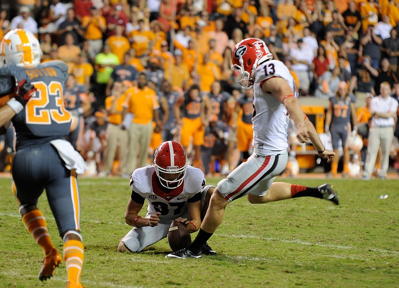 Georgia kicker Marshall Morgan makes a 42-yard field goal that enabled the Bulldogs to topple Tennessee 34-31 in overtime in 2013.
