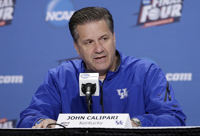 
              Kentucky head coach John Calipari answers a question during a news conference for the NCAA Final Four tournament college basketball semifinal game Thursday, April 2, 2015, in Indianapolis. (AP Photo/Darron Cummings)
            