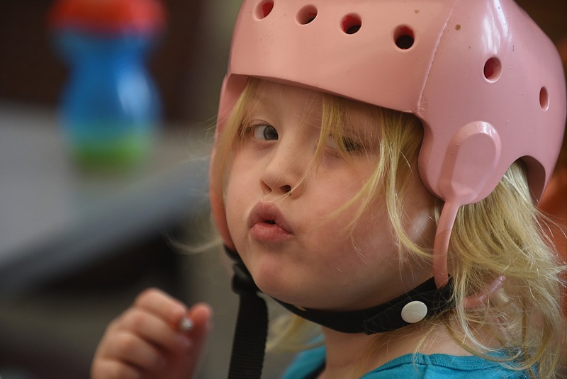 Five-year-old Cora Vowell has from 9-12 seizures a day. She and her mother, Melissa Vowell, attended a meeting to discuss the legalization of medical marijuana with Times Free Press editors and writers on April 1, 2015.