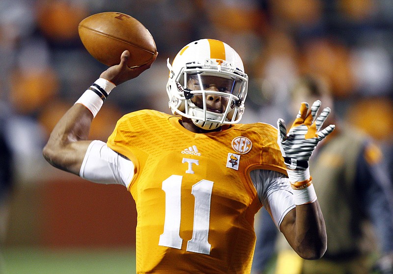 Tennessee quarterback Joshua Dobbs throws during warm ups before a game against Missouri in Knoxville in this Nov. 22, 2014, file photo. 