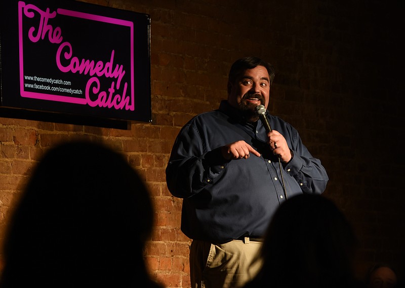 Moody Molavi warms up the Saturday night, March 28, 2015, crowd at The Comedy Catch as the opening act. Molavi also serves as the nightly emcee.