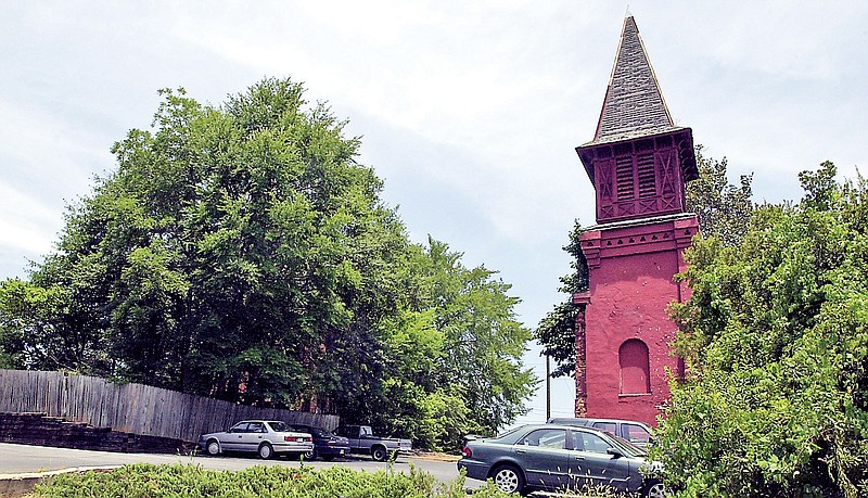 This steeple at the edge of a parking lot of the Steeplechase Condominiums complex on Oconee Street in Athens, Ga., shown on July 16, 2004, is all that remains of St. Mary's Episcopal Church, where R.E.M. played its first show in 1980.