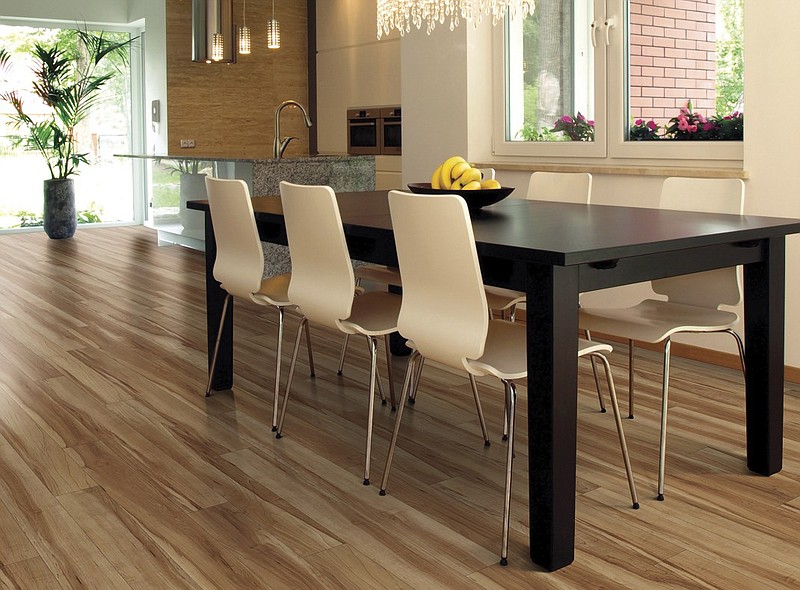 The COREtec hardwood floor displayed here takes multi-layered luxury vinyl flooring and puts a tested-and-approved waterproof core at the center. The new type of flooring was developed by USFloors in Dalton.