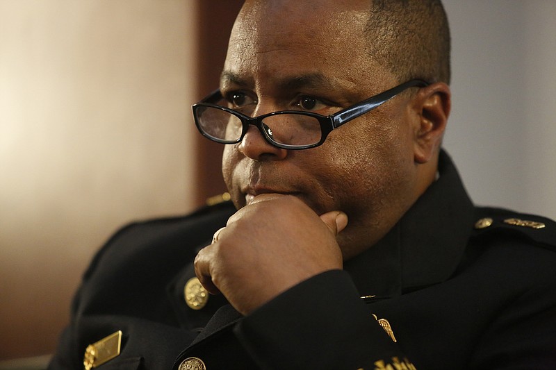 Chattanooga Fire Department Chief Lamar Flint listens as the city's Deputy COO Brent Goldberg presents the 2014 city budget in this, May 27, 2014, file photo.