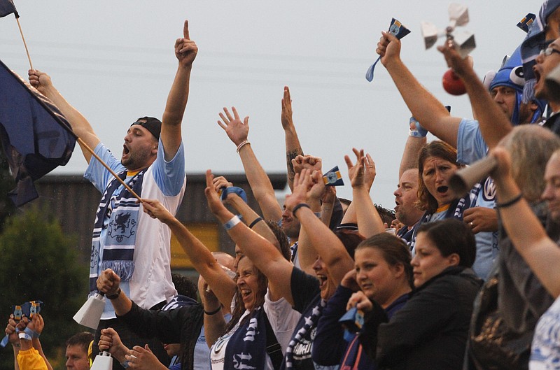 Chattahooligans celebrate the Chattanooga Football Club's 2-0 win over Miami United Football Club CFC during the region playoff match held at Finley Stadium in this July 18, 2014, file photo.
